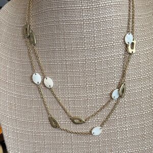 Elegant Gold and White Necklace